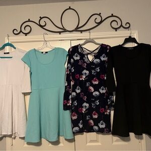 Set of Four Dresses in Various Colors